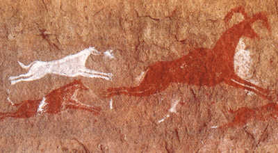 Наскальный рисунок с изображением охоты с собаками